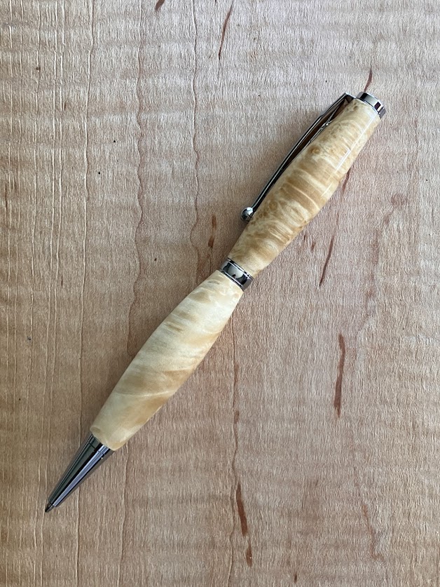 22.) Hand turned natural burl wood pen