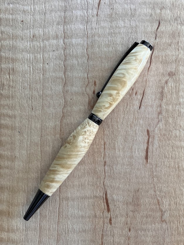21.) Hand turned natural burl wood pen